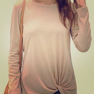 Women’s beige tunic top with twist tie at bottom